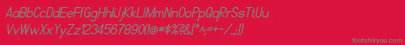 FibelNordItalic-Schriftart – Graue Schriften auf rotem Hintergrund