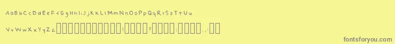 NaomishandRegular Font – Gray Fonts on Yellow Background