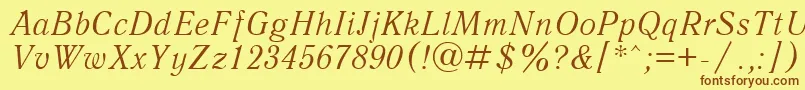 Шрифт AntiquaItalicCyrillic – коричневые шрифты на жёлтом фоне