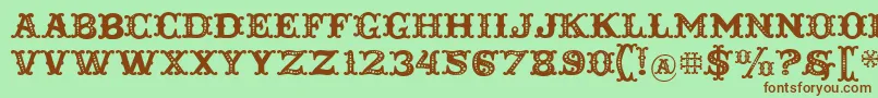 Toscania Font – Brown Fonts on Green Background