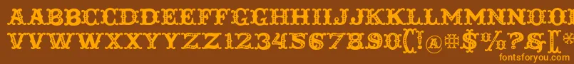 Toscania Font – Orange Fonts on Brown Background