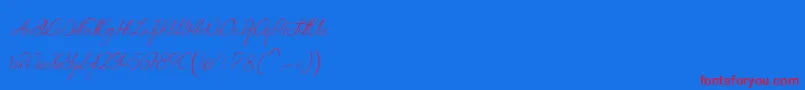 フォントSeductionOfCristabelle – 赤い文字の青い背景