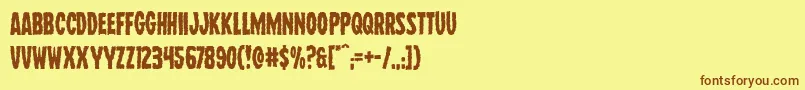 フォントWolfbrothers – 茶色の文字が黄色の背景にあります。