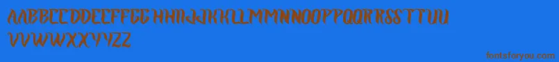RoyalJelly Font – Brown Fonts on Blue Background