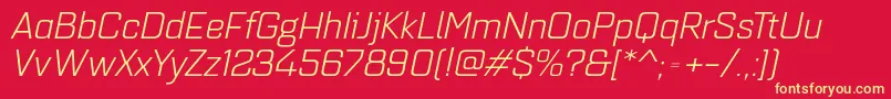 Fonte Quarcaextbookitalic – fontes amarelas em um fundo vermelho