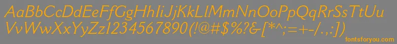 フォントCantoriamtstdItalic – オレンジの文字は灰色の背景にあります。