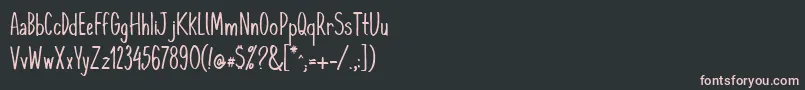 フォントKomixcon – 黒い背景にピンクのフォント