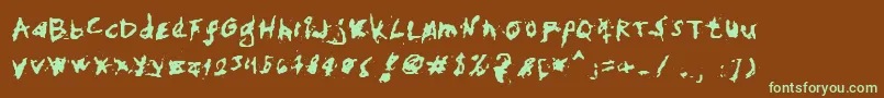フォントMyHandFightsLs – 緑色の文字が茶色の背景にあります。