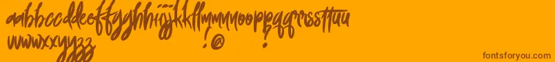 FoxingDemoVersion-Schriftart – Braune Schriften auf orangefarbenem Hintergrund