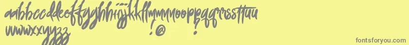 FoxingDemoVersion-Schriftart – Graue Schriften auf gelbem Hintergrund