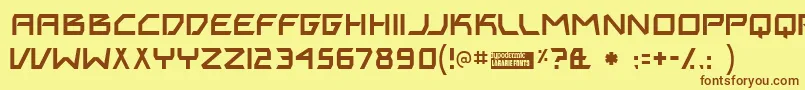 フォントBiting – 茶色の文字が黄色の背景にあります。