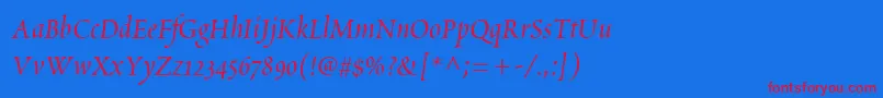 ScriptoriaSsi Font – Red Fonts on Blue Background