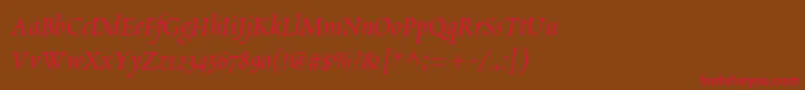 フォントScriptoriaSsi – 赤い文字が茶色の背景にあります。