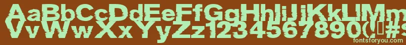 フォントGrotb – 緑色の文字が茶色の背景にあります。