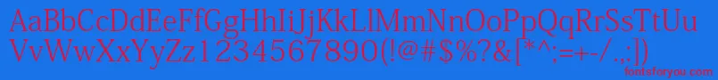 KozminproLight Font – Red Fonts on Blue Background