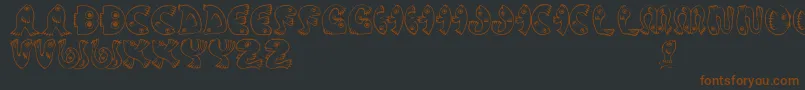 JmhPez Font – Brown Fonts on Black Background