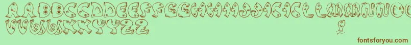 JmhPez Font – Brown Fonts on Green Background