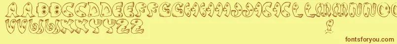 JmhPez Font – Brown Fonts on Yellow Background