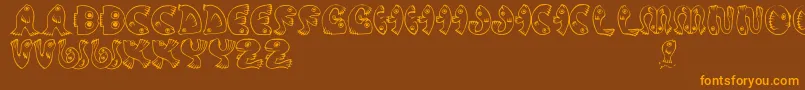 JmhPez Font – Orange Fonts on Brown Background