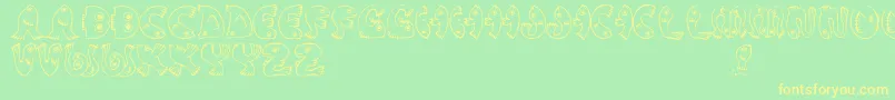 JmhPez Font – Yellow Fonts on Green Background