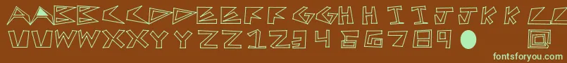 フォントFirstTry – 緑色の文字が茶色の背景にあります。