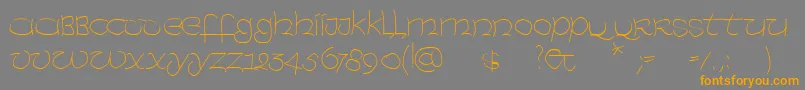 UncialexpressLight Font – Orange Fonts on Gray Background