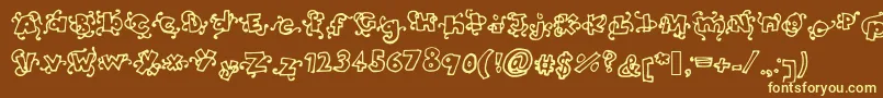 Headinthecloudsbold-fontti – keltaiset fontit ruskealla taustalla