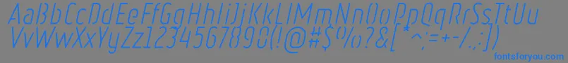 Czcionka RulerStencilLightItalic – niebieskie czcionki na szarym tle
