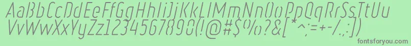 Czcionka RulerStencilLightItalic – szare czcionki na zielonym tle