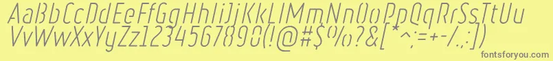 フォントRulerStencilLightItalic – 黄色の背景に灰色の文字