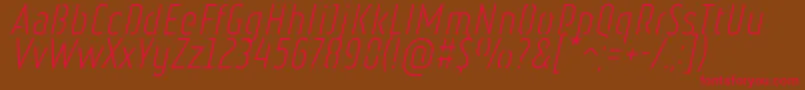 Fonte RulerStencilLightItalic – fontes vermelhas em um fundo marrom