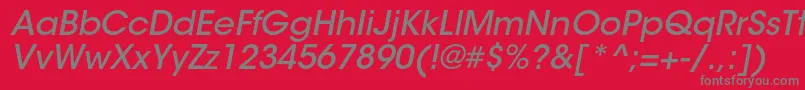 フォントItcavantgardestdMdobl – 赤い背景に灰色の文字