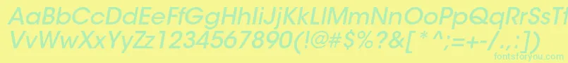 フォントItcavantgardestdMdobl – 黄色い背景に緑の文字