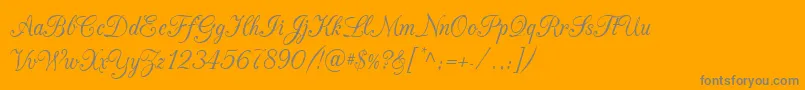 CacChampagne-Schriftart – Graue Schriften auf orangefarbenem Hintergrund