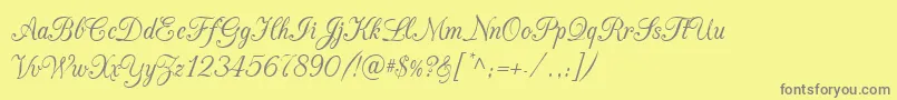 CacChampagne Font – Gray Fonts on Yellow Background