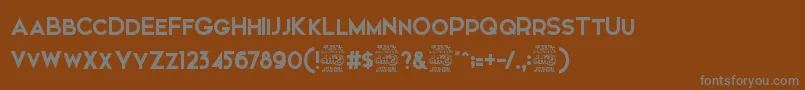 Weitere Informationen zur ElkwoodFree-Schriftart ElkwoodFree-Schriftart – Graue Schriften auf braunem Hintergrund