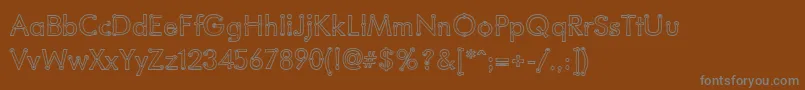 BlacksmithDelightOutlined-fontti – harmaat kirjasimet ruskealla taustalla