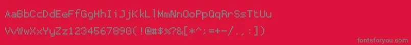 fuente Proggytiny – Fuentes Grises Sobre Fondo Rojo