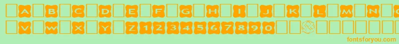 AlphashapesCrosses3 Font – Orange Fonts on Green Background