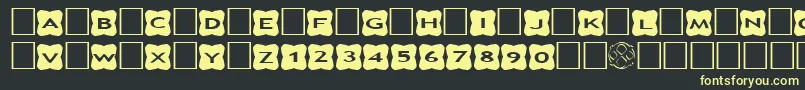 AlphashapesCrosses3 Font – Yellow Fonts on Black Background