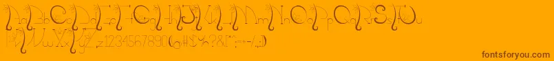 KalopsiaTtf-Schriftart – Braune Schriften auf orangefarbenem Hintergrund