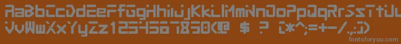 Procyon-fontti – harmaat kirjasimet ruskealla taustalla