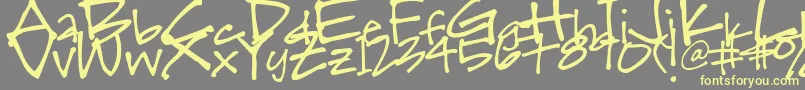 フォントSkwirl – 黄色のフォント、灰色の背景