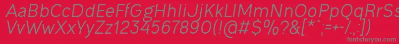 OgonekItalic-Schriftart – Graue Schriften auf rotem Hintergrund