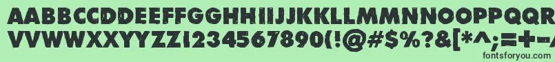 フォントDivisibleInvisibleLow – 緑の背景に黒い文字