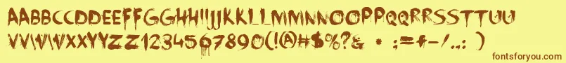 FaceYourFears-Schriftart – Braune Schriften auf gelbem Hintergrund