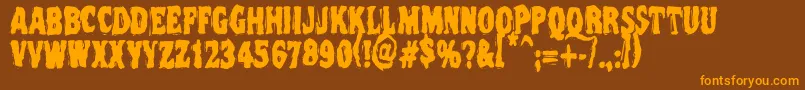 Vtc Nightofthedeadcorruptcaps-Schriftart – Orangefarbene Schriften auf braunem Hintergrund