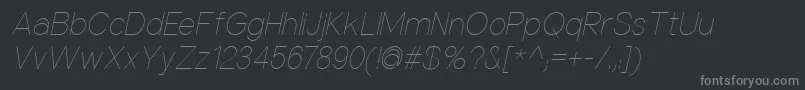 Czcionka NuorderThinitalic – szare czcionki na czarnym tle