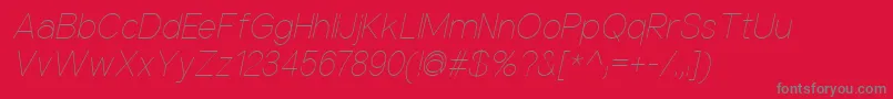 Fonte NuorderThinitalic – fontes cinzas em um fundo vermelho