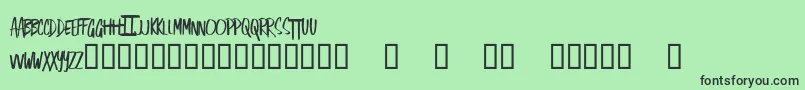 フォントSingOut – 緑の背景に黒い文字